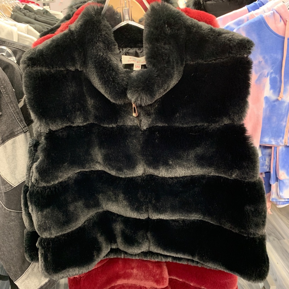 Fox fur vest.